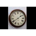 Circular School Clock mahogany case with enamel dial and Roman Numerals.