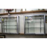 Chrome & Glass Display Cabinet with three moveable glass shelves and lighting,