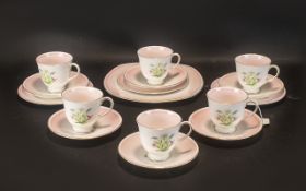 Wedgwood Susie Cooper Tea Set comprising six tea cups and saucers and a large cake plate.