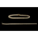 9ct Gold Diamond Bracelet each link set with a round cut diamond. Fully hallmarked. Length 7.25