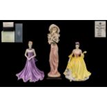 Collection of Three Porcelain Figures comprising Royal Doulton Pretty Ladies 'Welsh Beauty' in