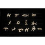 Collection of 14 Silver Charms comprising: a Sentry in his box; a Billy Goat; a Dancer; £ sign;