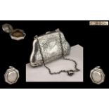 A Silver Opera Purse with adjustable chain and handle, Of typical form and engraved front.