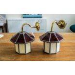 Two Glass Leaded Wall Lamps in lantern shape, in cream and ruby glass of the Art Deco style.
