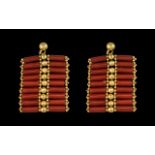 18ct Gold and Red Coral Set Pair of Earrings - In Chinese Firecrackers Design. Marked 18ct.