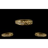 18ct Gold - Attractive and Well Designed 5 Stone Diamond Set Ring. Marked 750 to Shank.