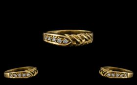 18ct Gold - Attractive and Well Designed 5 Stone Diamond Set Ring. Marked 750 to Shank.