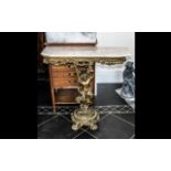 Gilded Carved Wood Consul Table of small size with a marble effect top,