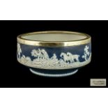 Wedgwood Bowl Blue Jasperware depicting a hunting scene, with marks to base 'Adams' Tunstall,