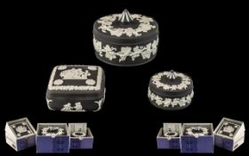 Black Wedgwood Jasper Candy Boxes three pieces to include a candy box round with white leaf design