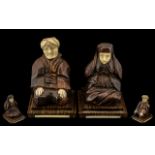 Pair of Art Deco Period French Macassar Wood and Ivory Carvings of a Seated Arab Man and Wife,