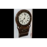 A Drop Dial Wall Clock rosewood case with mother of pearl inlay , tin dial with Roman Numerals.