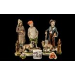 Collection of Miscellaneous Porcelain Figures, consisting of two Capo-di-Monte dogs 5'' high; Capo-