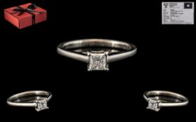 Forever Diamonds White Gold Single Stone Diamond Ring set with a modified Princess cut diamond,