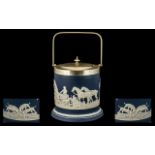 An Adams Tunstall After Wedgwood Biscuit Barrel depictinf a hunting scene with figures,
