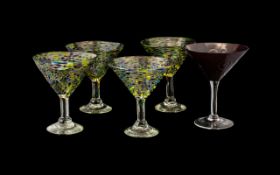 Collection of Decorative Cocktail/Sundae Glasses comprising four matching glasses on raised stems