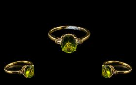 Peridot and Diamond Ring, a 3ct oval cut peridot solitaire,