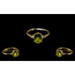 Peridot and Diamond Ring, a 3ct oval cut peridot solitaire,