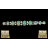 Antique Period Superb Quality Platinum Opal and Diamond Set Long Brooch of Graduated Form,