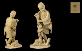 Japanese Meiji Period Sectional Ivory Figure of a man playing with a monkey. Signed to base.