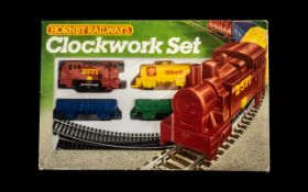 Hornby Railways Boxed Clockwork Set comprising 1/ 0-4-0 Clockwork Engine and key, 2/ Assorted