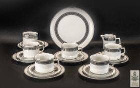 Winterling Bavarian Tea Service in white ground with silver trim, comprising five cups,