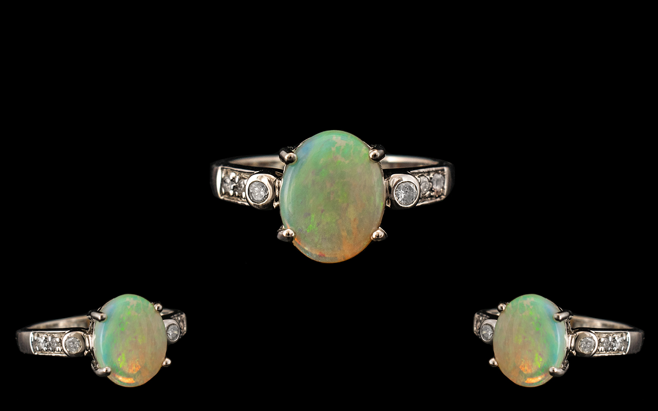 Ladies 14ct White Gold Attractive Opal and Diamond Set Dress Ring. Full Hallmark for 585 - 14ct.