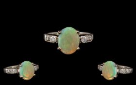 Ladies 14ct White Gold Attractive Opal and Diamond Set Dress Ring. Full Hallmark for 585 - 14ct.