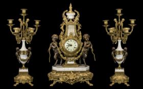 A 20th Century Brass And Marble Cased Clock Garniture In the Louis XV style,