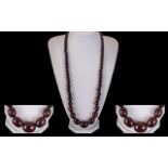 Early 20th Century Cherry Amber Long Graduated Bead Necklace of Excellent Quality. c.1920's.