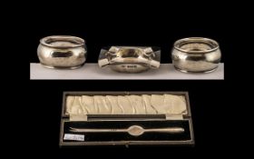 Four Pieces of Silver to include a lobster stick in a fitted box, hallmarked for Birmingham F 1930,