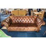Large Tan Brown Three Seater Buttoned Chesterfield Sofa with splayed out shaped rolling arms,