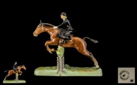 Beswick Hand painted Figure 'Hunts woman' Model No. 982. Designer L Harrington.