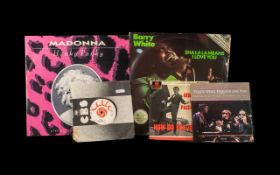 Barry White 12" 'Sha La La Means I Love You' and Madonna 12" 'Hanky Panky',