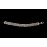 Ladies Sterling Silver Bracelet in case. Attractive design, link style. Silver weight 24.7 grams.