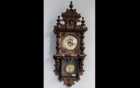 Late 19th Century Walnut Drop Dial Wall Clock cream dial with Arabic numerals.