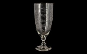 A Victorian Preston Guild Glass Celery Vase with etched decoration and dated 1882.