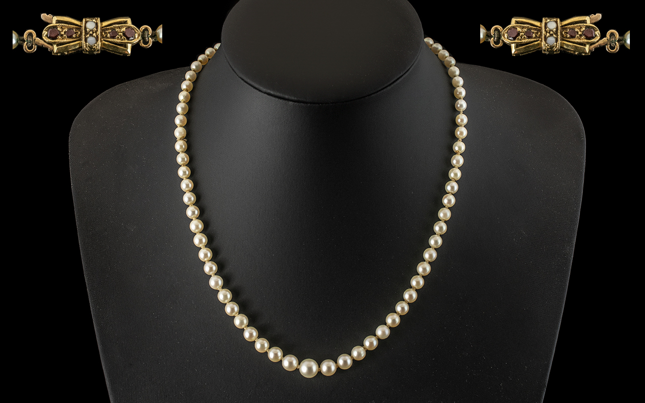 Ladies - Good Quality Graduated Single Strand Cultured Pearl Necklace with 9ct Gold Stone Set Clasp.