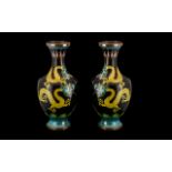 Pair of Chinese Cloisonne Vases decorated to the body with a swirling dragon chasing the pearl.