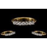 18ct Gold - Attractive Seven Stone Diamond Set Dress Ring. Fully Hallmarked for 750 - 18ct.