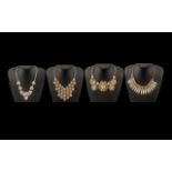 Four Ornate Vintage Necklaces comprising pastel colours with gems,