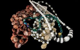 Murano Glass Bead Necklaces comprising