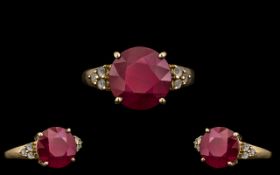 Ladies 9ct Gold Single Stone Ruby Ring with Stone Set Shoulders.