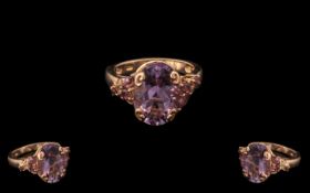 Rose de France Amethyst Fancy Mount Ring, an oval cut Rose de France amethyst of 5cts,