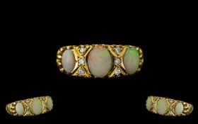 Antique Period Attractive 18ct Gold Opal and Diamond Set Ring with ornate gallery setting;