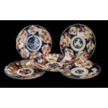Five Small Antique Imari Plates of Lobed shape, decorated in traditional Imari colours and designs.
