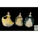 Three Royal Doulton Figures, comprising 'Ninette' HN 2379, 9" tall'; 'Elegance' HN 2254,