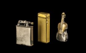 Unusual Violin Shaped Plated Metal Vesta Case with two vintage lighters,