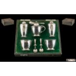 A Fine Quality Boxed ( 7 ) Piece Sterling Silver Cruet Set of Excellent Design.