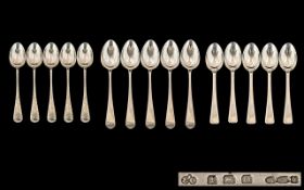 Edwardian Period - A Set of Six Sterling Silver Old English Pattern Tea Spoons.